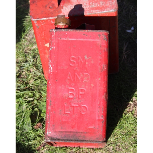 732 - 2 vintage fuel cans with brass caps, one marked SM and BP LTD, with some contents