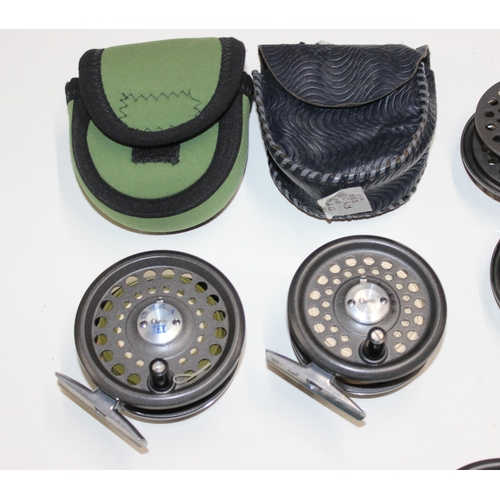 712 - 3 Orvis Madison fly fishing reels & 2 spare spools. Reels are in reel cases