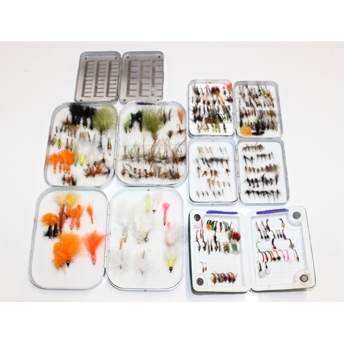 719 - A fantastic collection of hand tied trout fishing flies most in cases