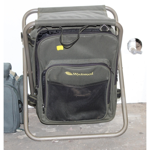 723 - A quantity of fishing luggage to include seat box, rod tubes, landing mat, tackle bags ect.