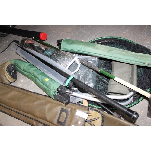 724 - A quantity of fly fishing tackle to include mainly landing nets but also rod holders, rod bags & fol... 