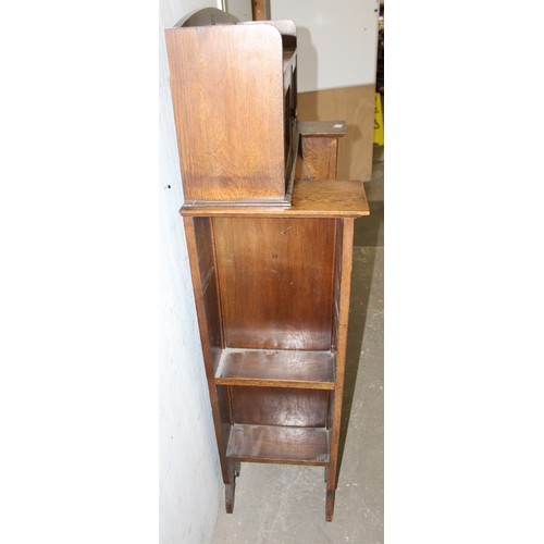 68 - An unusual Art Nouveau oak folding desk with glazed bookcase cabinet to top, bookcase sides and carv... 