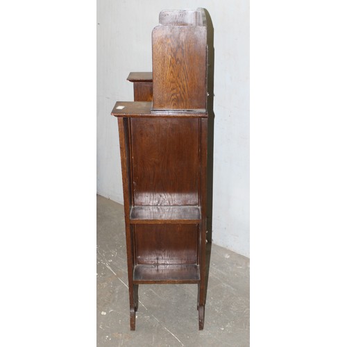 68 - An unusual Art Nouveau oak folding desk with glazed bookcase cabinet to top, bookcase sides and carv... 