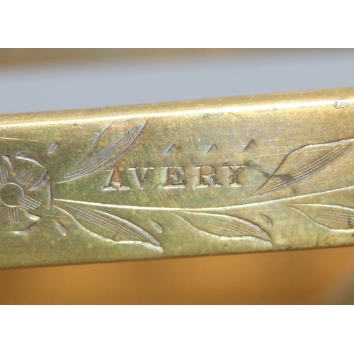 673 - A set of antique decorative brass and wooden letter scales with weights by Avery