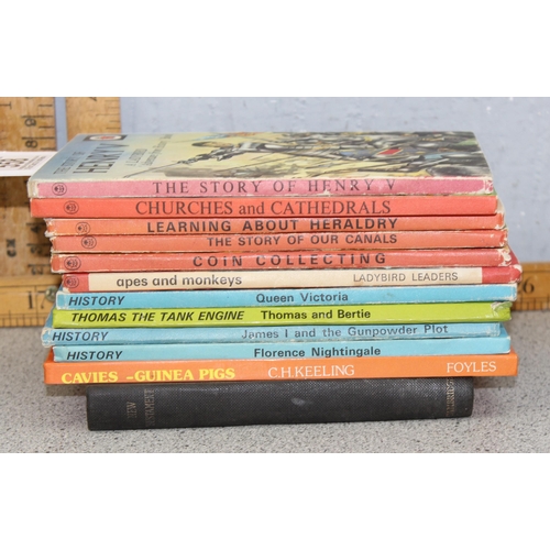 558 - 11 children's vintage ladybird books & an Elizabeth ll coronation book.