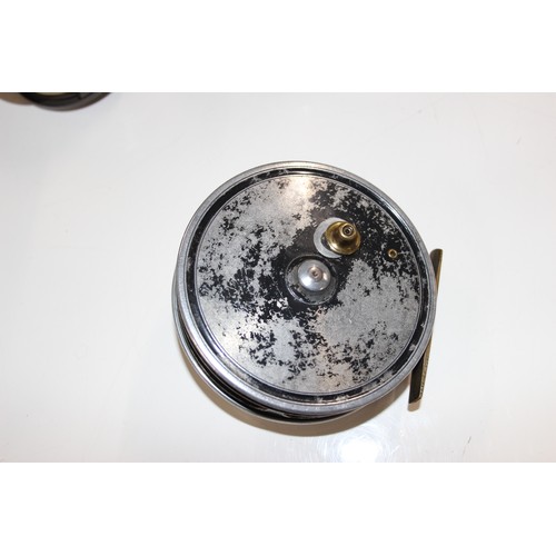 715 - 4 fly fishing reels in carry case along with spare spools and reel cases. Reels include Shakespear S... 