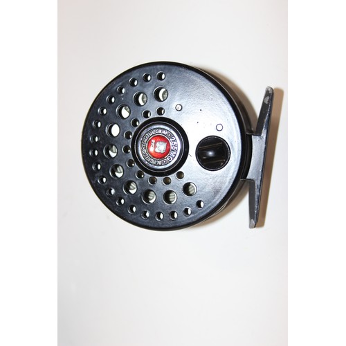 715 - 4 fly fishing reels in carry case along with spare spools and reel cases. Reels include Shakespear S... 