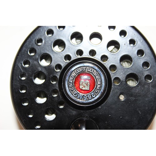 715 - 4 fly fishing reels in carry case along with spare spools and reel cases. Reels include Shakespear S... 