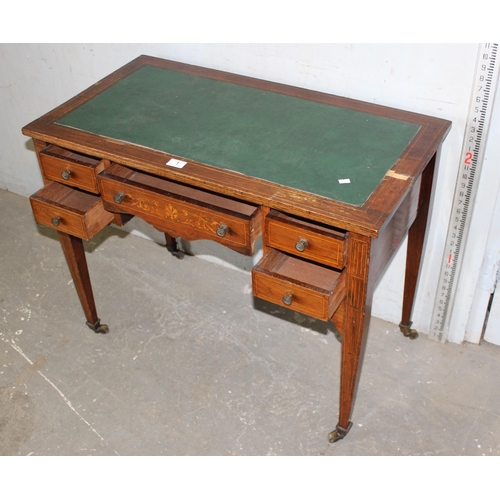 1 - A small Victorian rosewood veneered writing desk with leather top and 5 drawers, inlaid decoration a... 