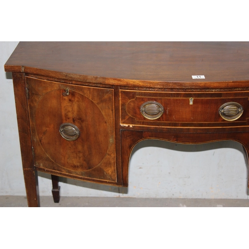 11 - An antique mahogany bow fronted sideboard, approx 125cm wide