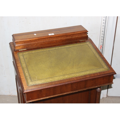 17 - An antique style Davenport desk with leather top