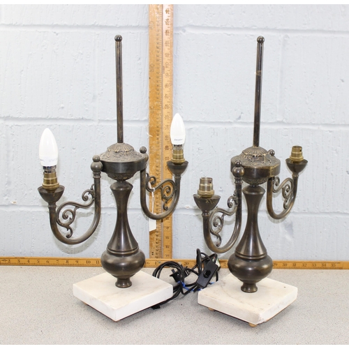 234 - A pair of bronzed metal and marble table lamps of classical form