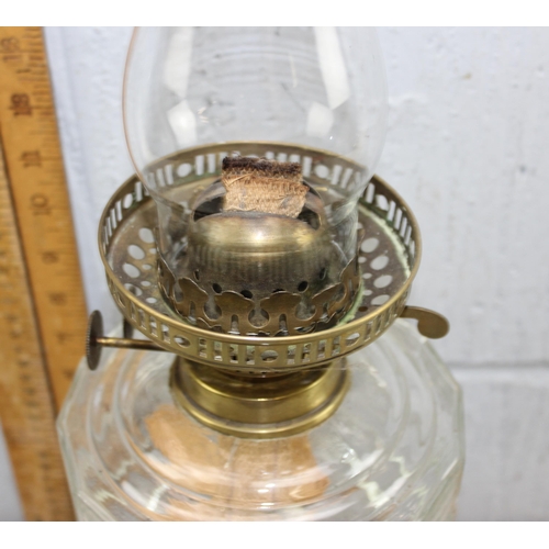 241 - Antique oil lamp with gold painted cast iron base