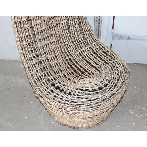 29 - An unusual woven wooden garden or conservatory chair