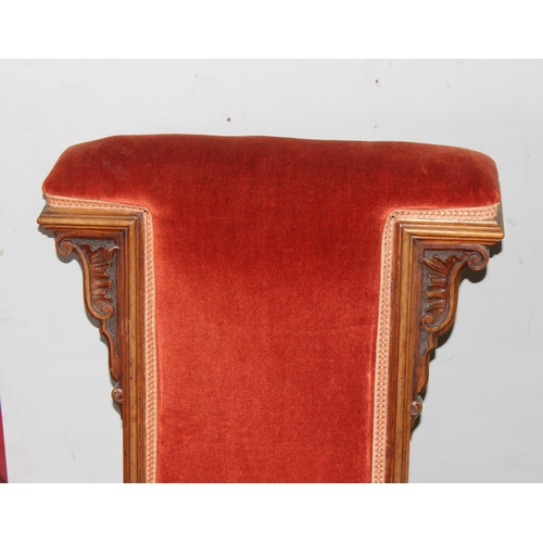 6 - A matched pair of antique Prie Dieu chairs with dark salmon coloured upholstery