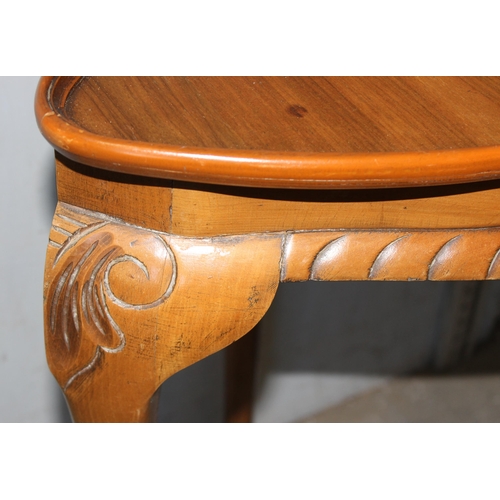 69 - Modern corner table with carved details