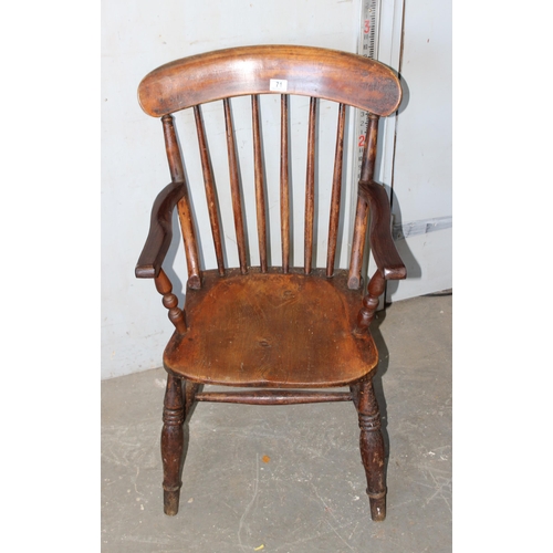 71 - An antique stickback farmhouse armchair with elm seat