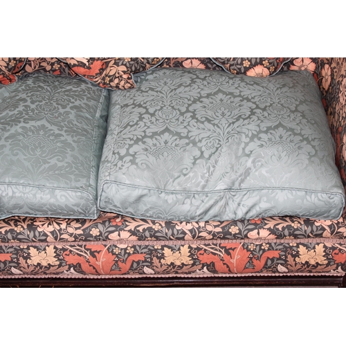 8 - An antique wooden framed couch or love seat with carved details and William Morris style upholstery ... 