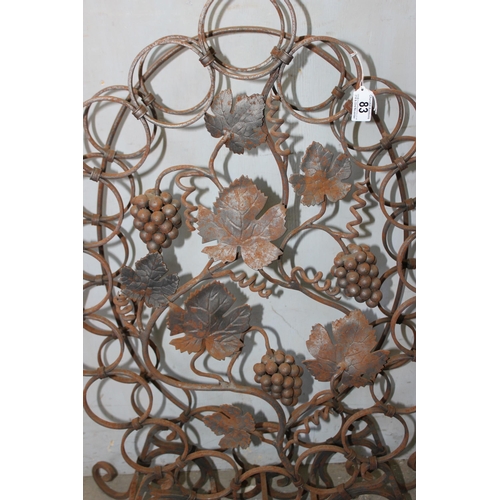 83 - Hand forged blacksmith made wine rack decorated with grape & vine motifs