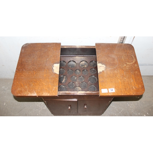 124 - An unusual mid-century drinks cabinet with slide opening top & an antique Chinese hardwood stand app... 