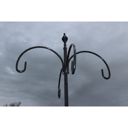 311 - 4 branch cast iron bird feeder hanger. Approx. 240cm high