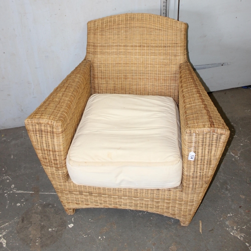 134 - Wicker conservatory armchair with cushion