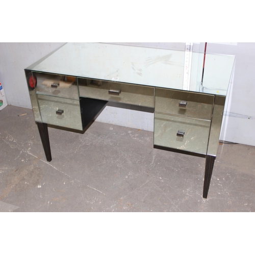 138 - A 5 draw mirrored desk with zebra wood legs