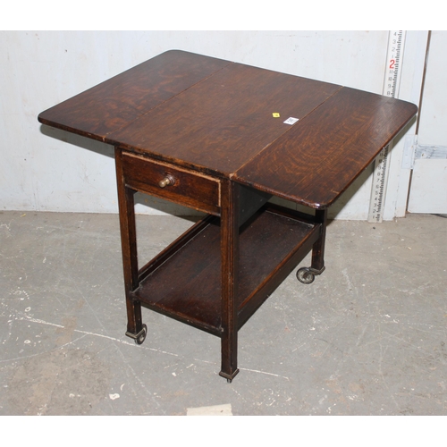 147 - Vintage oak drop leaf tea trolley with cutlery draw