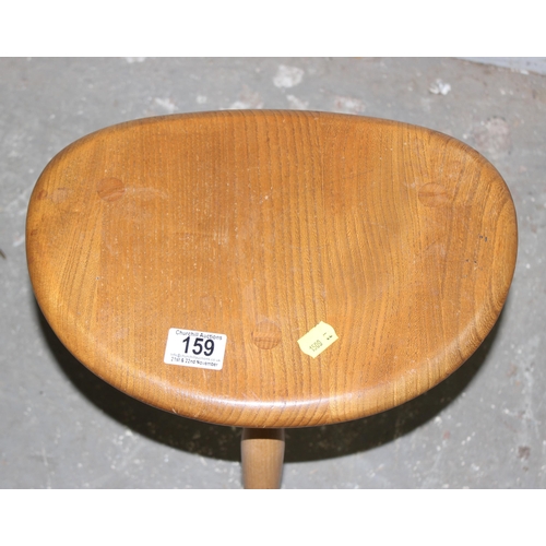 159 - Retro Ercol pebble table, blonde finish with blue & gold label, approx 34cm wide