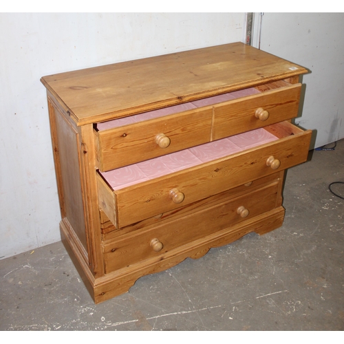 167 - Antique style pine 4 drawer chest of drawers with bun handles, approx 107cm wide