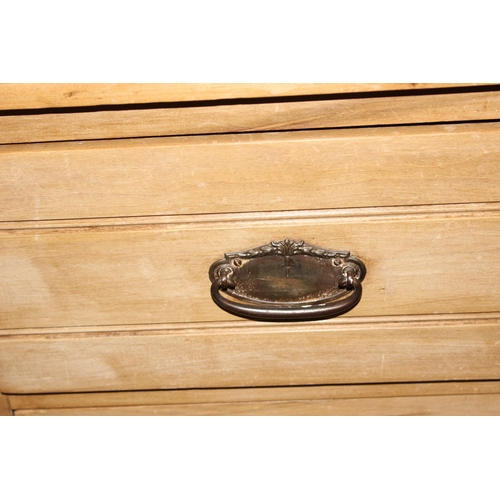 168 - An antique stripped pine dressing chest with mirror top over a 3 drawer base, approx 92cm wide