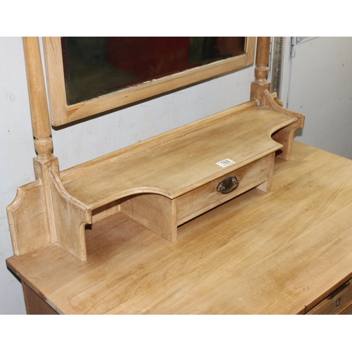 168 - An antique stripped pine dressing chest with mirror top over a 3 drawer base, approx 92cm wide