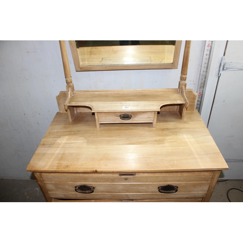 168 - An antique stripped pine dressing chest with mirror top over a 3 drawer base, approx 92cm wide