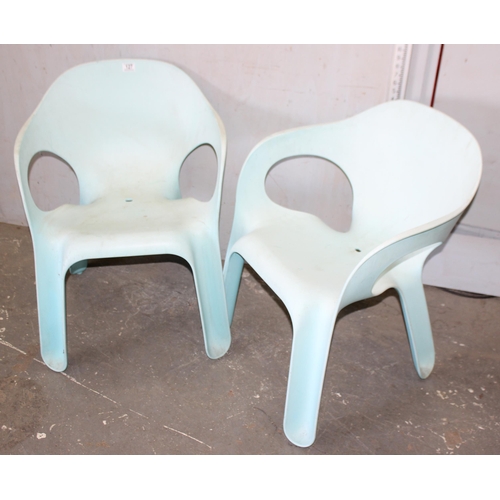 127 - Pair of Italian easy stacking chairs. Designed by Jerszy Seymour for Magis