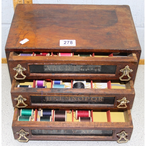 278 - A vintage wooden 3 drawer box with brass handles and glass panels, likely a printers box now contain... 