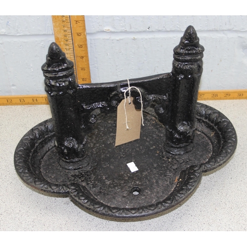 306 - An antique cast iron boot scraper