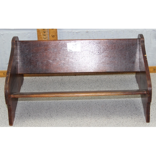 79 - A small antique mahogany footstool with signature to base and an oak book trough (2)