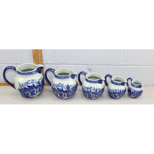 1892 - Graduated set of 5 blue & white ironstone jugs