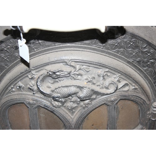 143 - Antique French cast iron stove by La Salamandre, decorated with dragons and rope twists