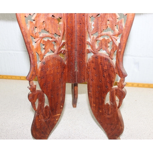 174 - Small Indian carved wooden folding table