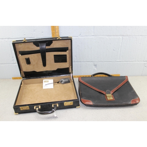 215 - 2 mens briefcases, 1 combination locked and 1 clasped