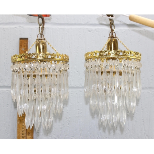 269N - A pair of vintage gilt metal and crystal drop hanging chandelier lamps