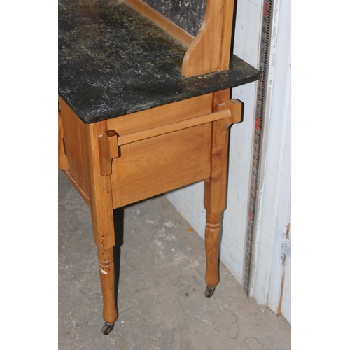 117 - Antique pine wash stand with marble top and carved details, approx 92cm wide