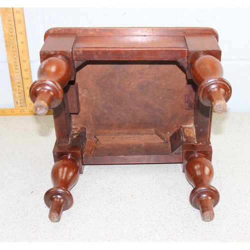 121 - A small antique mahogany low stool with turned legs