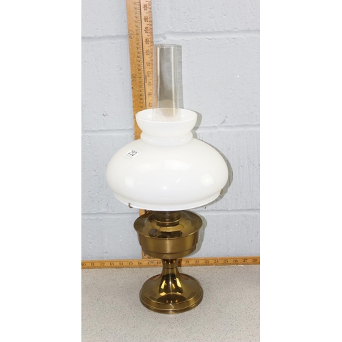 252 - Vintage brass oil lamp with white glass shade and extras