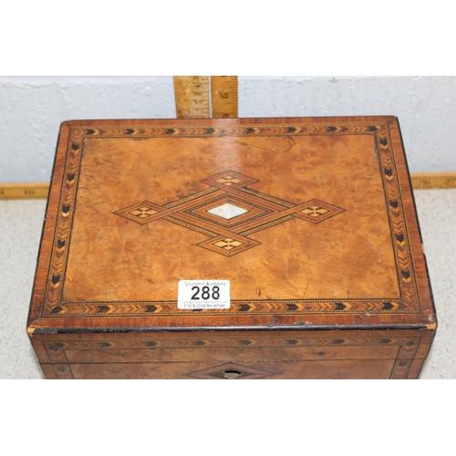 288 - An antique wooden box with marquetry inlay