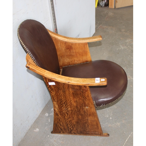 21 - An unusual Art Deco style oak chair with studded red leather seat