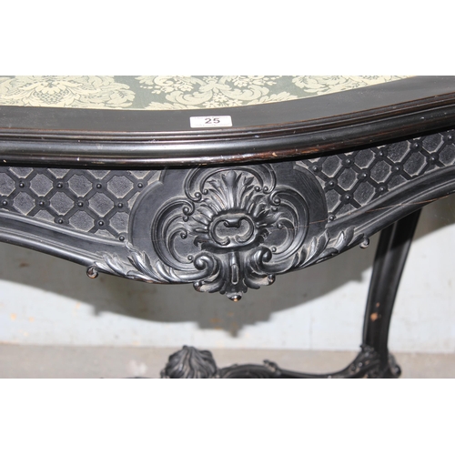 25 - A 19th century Continental ebonised and profusely carved side table with green fabric top in the Ger... 