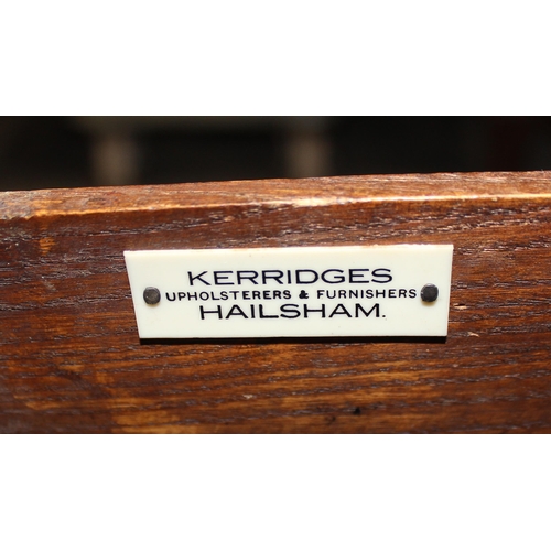 65 - An 18th century style lowboy with brass drop handles and cabriole legs by Kerridges of Hailsham, app... 