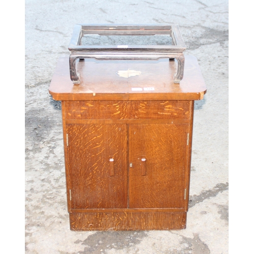 124 - An unusual mid-century drinks cabinet with slide opening top & an antique Chinese hardwood stand app... 